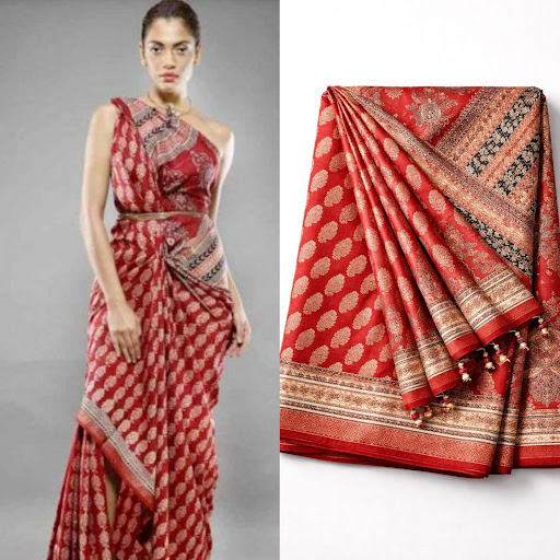Red traditional silk saree with gold woven motifs and ornate border, ideal for festive ethnic and wedding wear.