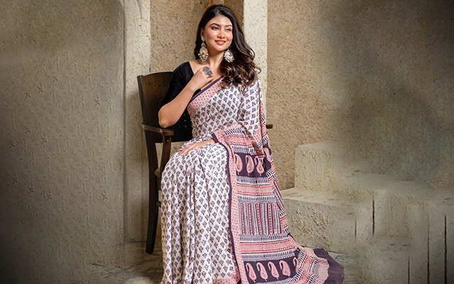 Woman wearing a Hand-Painted Saree white and black