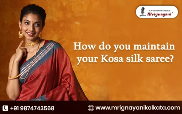 Beautiful woman in a red Kosa silk saree with a blue border, highlighting silk saree maintenance and care tips by Mrignayani Kolkata.