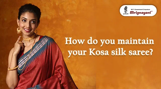 Beautiful woman in a red Kosa silk saree with a blue border, highlighting silk saree maintenance and care tips by Mrignayani Kolkata.