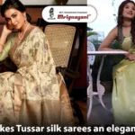 Beautiful women showcasing luxurious Tussar silk sarees in beige floral and pastel green designs, featuring elegant drapes and traditional Indian ethnic fashion by Mrignayani Kolkata.